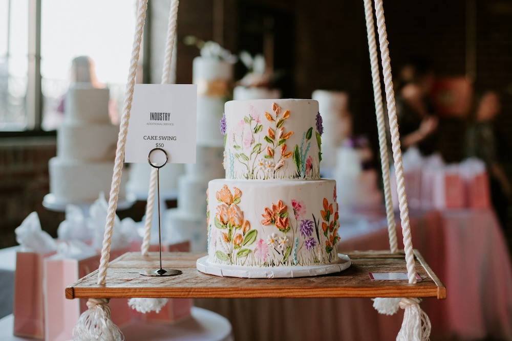 Cake on a swing at INDUSTRY