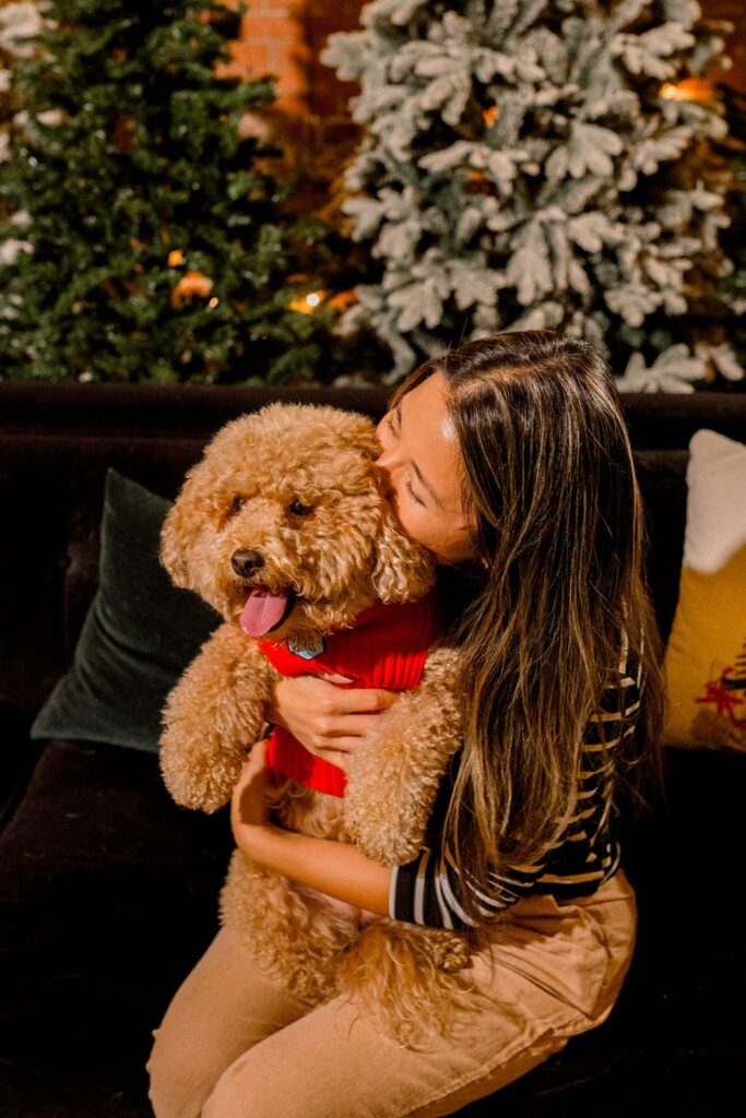 Woman hugging her dog