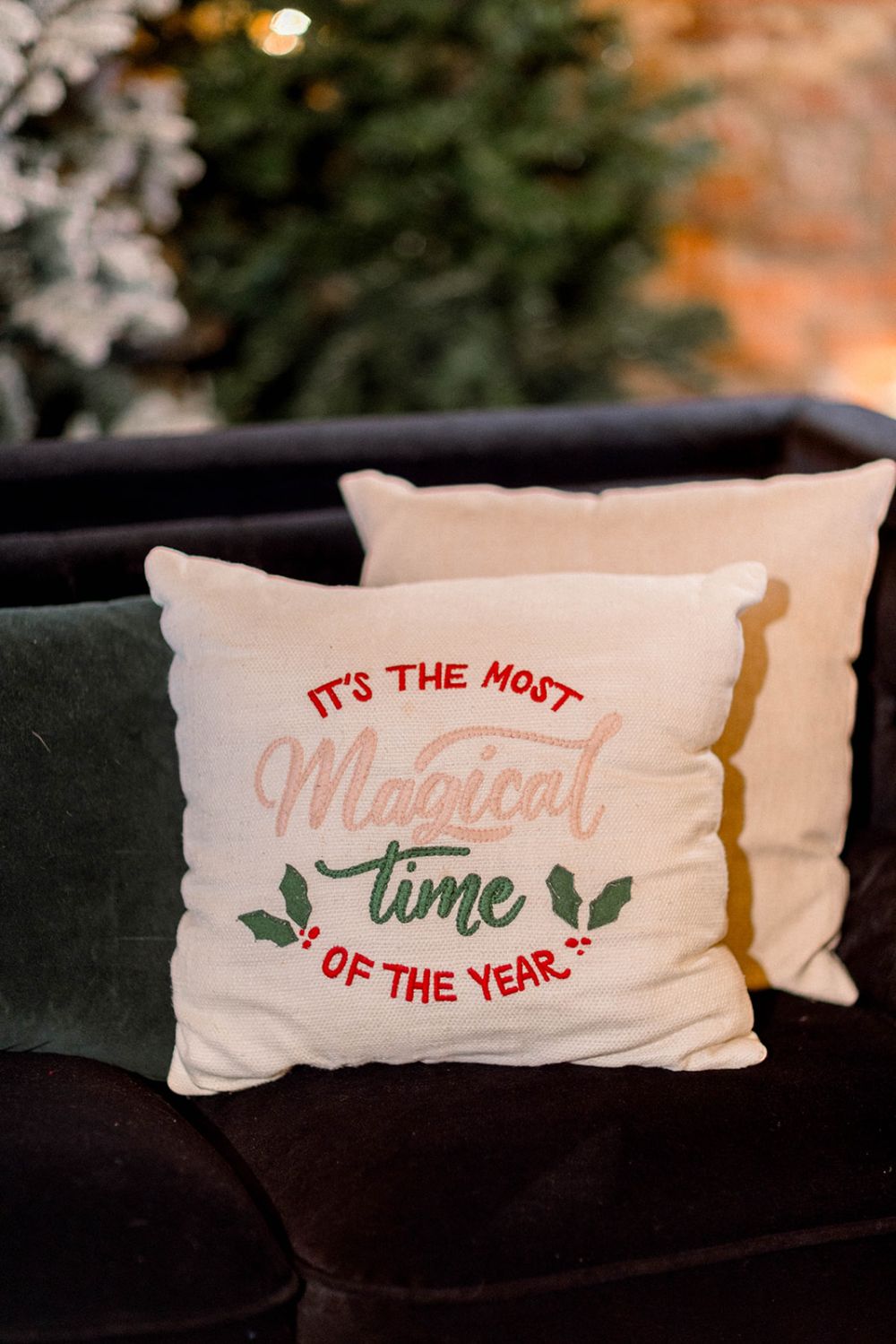 Festive pillows on a lounge area at a Indianapolis office holiday party thrown at INDUSTRY.