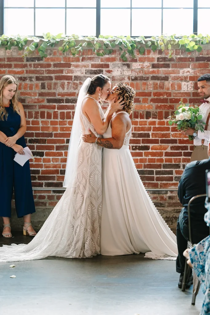 Brides sharing their first kiss after "I do"