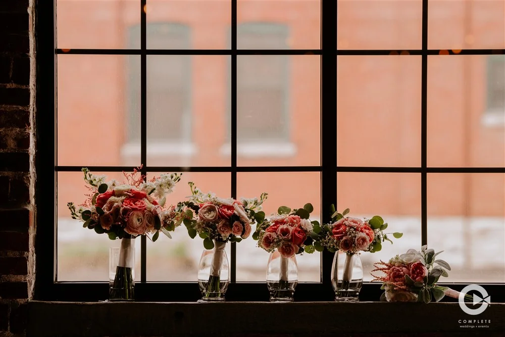 Bouquets on a windowsill at INDUSTRY