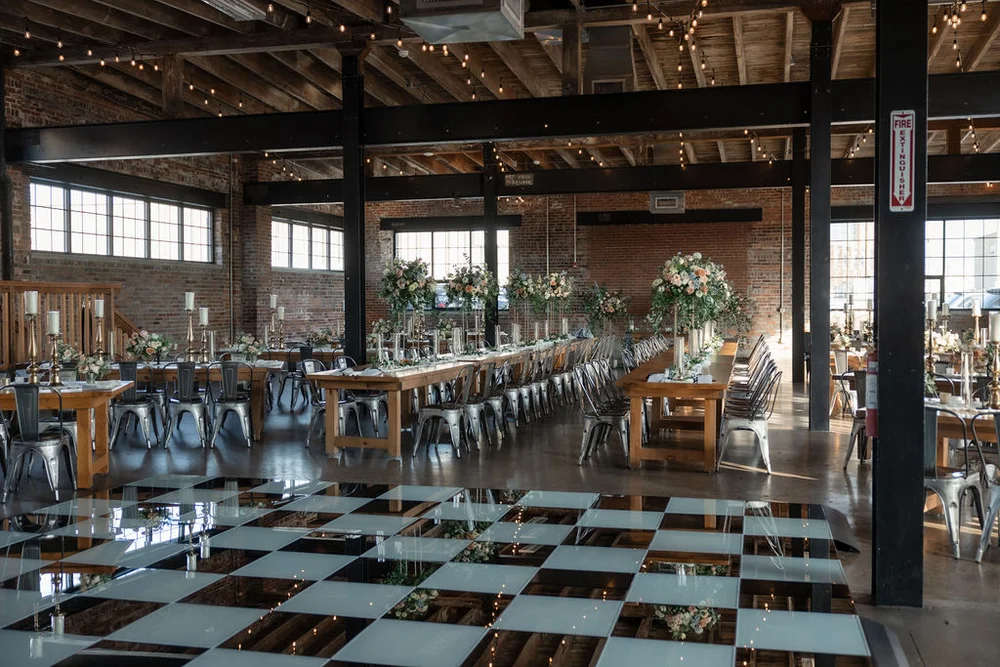 Black & white dance floor at winter wedding at INDUSTRY in Indianapolis