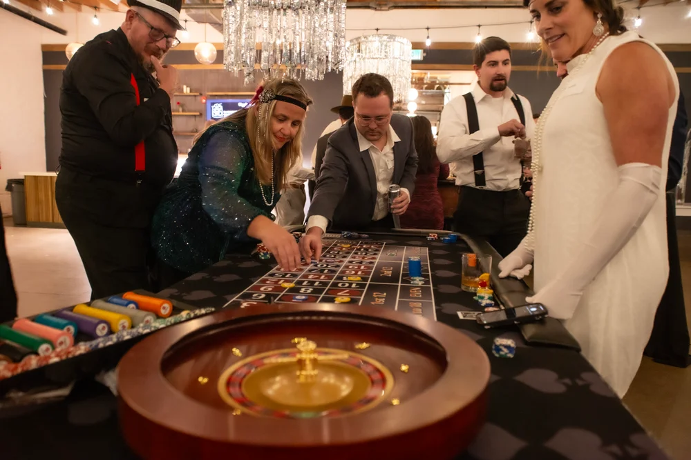 Guests playing casino games at holiday party INDUSTRY in Indianapolis, IN
