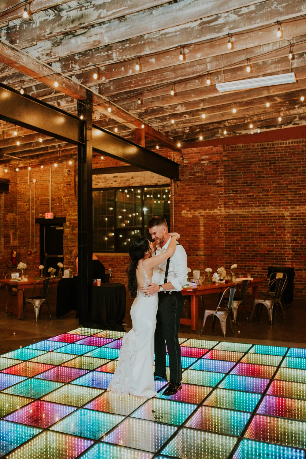 Bride and groom sharing a private last dance at INDUSTRY in Indianapolis, IN