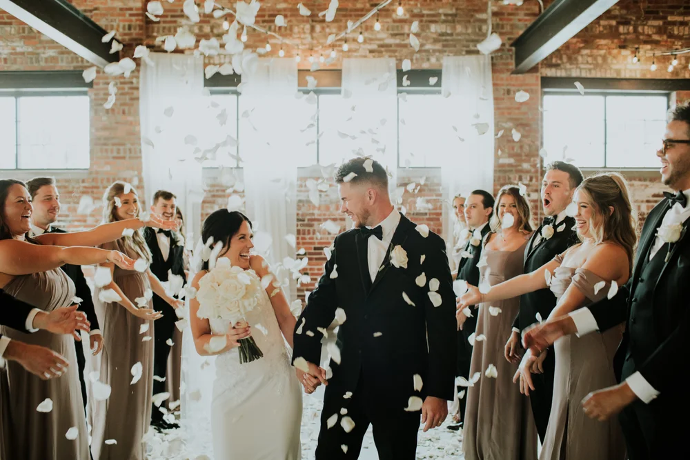 Bride and groom walking down the aisle after the wedding ceremony at INDUSTRY in Indianapolis