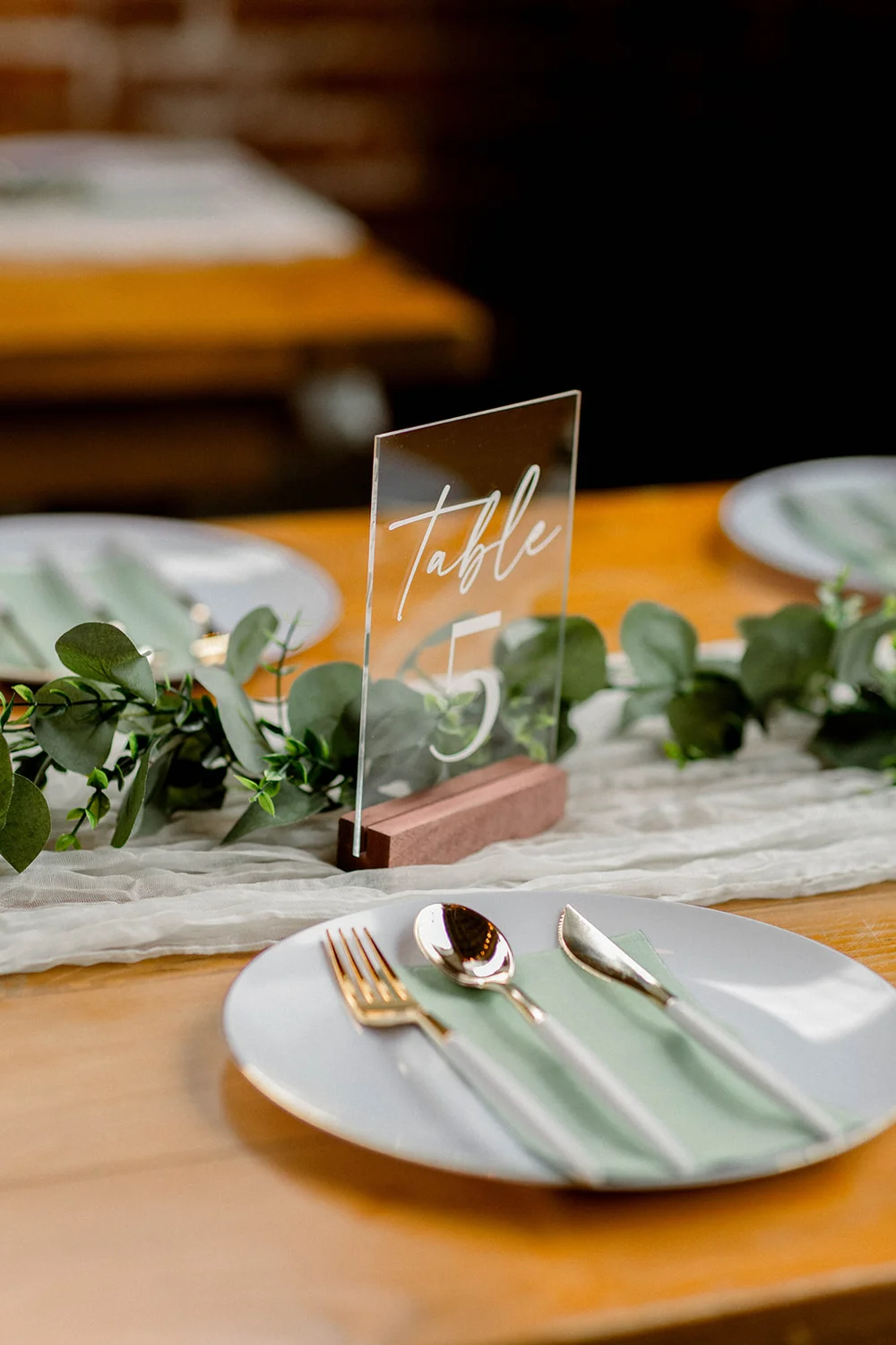 Close-up of table décor and place settings at an Indianapolis wedding reception.