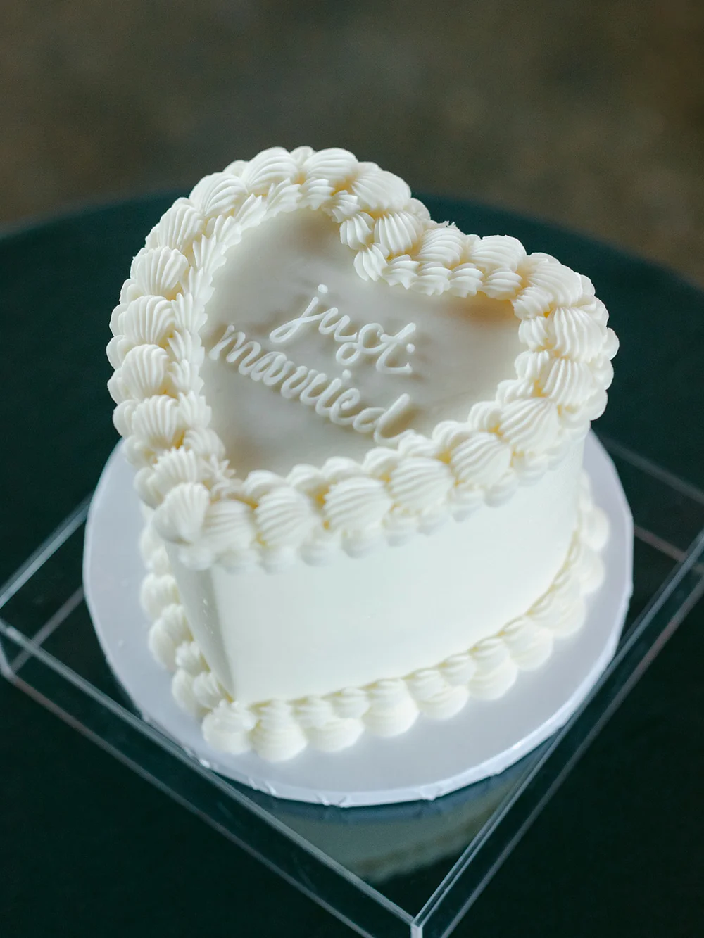 Vintage heart-shaped wedding cake at INDUSTRY Indianapolis black and white wedding.