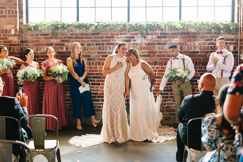 LGBTQ+ brides after their wedding ceremony at INDUSTRY venue in Indianapolis IN